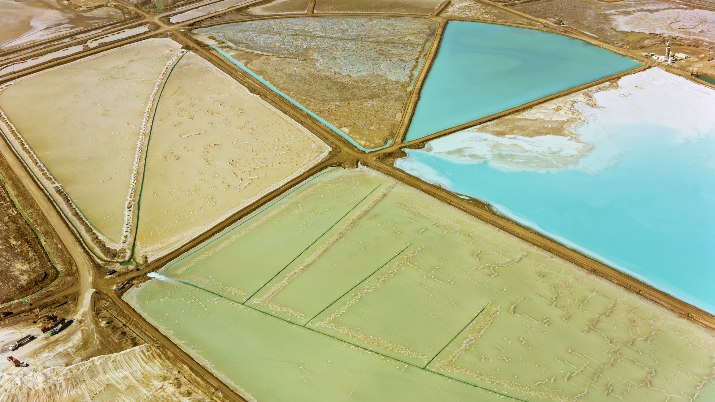 Aerial view of turquoise coloured pools at Silver Peak Lithium Mine, Nevada, California, USA.